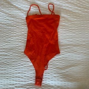 Garage orange bodysuit (size S)